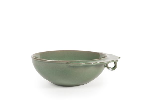 A GREEN JUN PORCELAIN HANDLED CUP
