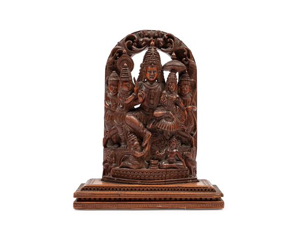 A WOODEN SCULPTURAL GROUP