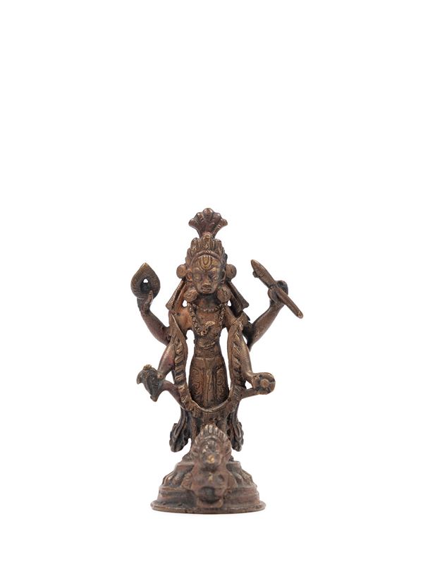A BRONZE FIGURE OF VISHNU