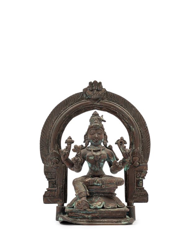 A BRONZE FIGURE OF PARVATI