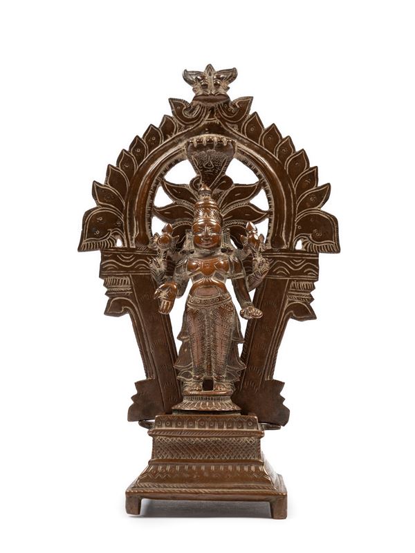 A BRONZE FIGURE OF VISHNU