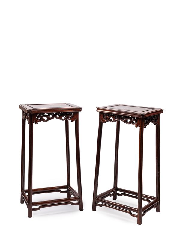 A PAIR OF WOODEN STANDS