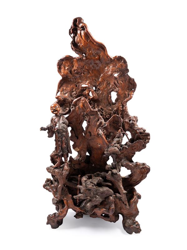 A WOODEN SCULPTURE