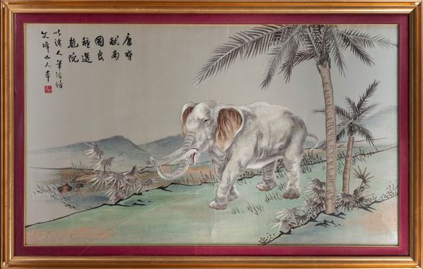AN EMBROIDERED SILK FABRIC