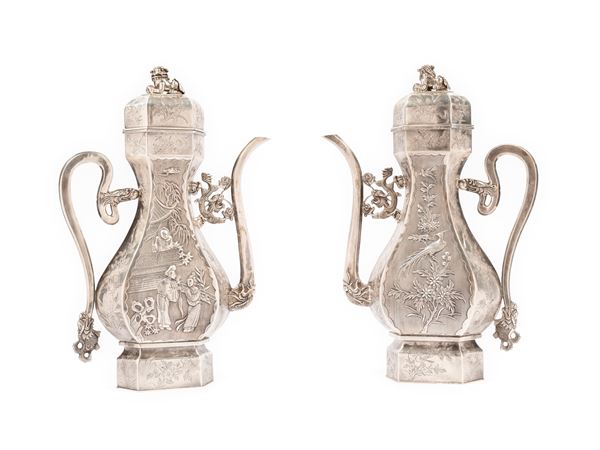 A PAIR OF SILVER TEAPOTS