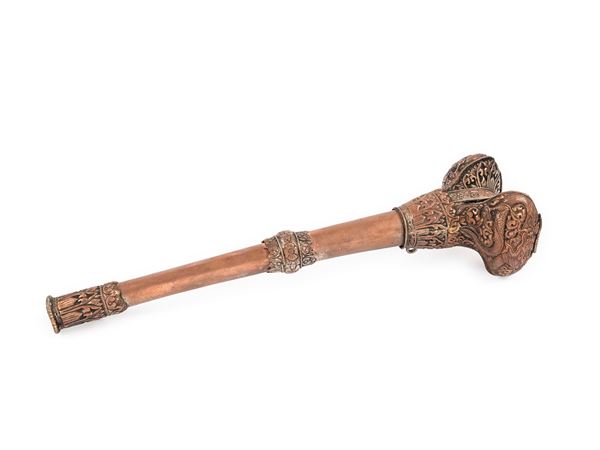 A RITUAL BONE AND COPPER FLUTE