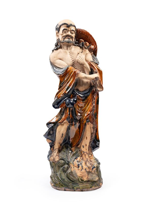 A HUGE SHIWAN CERAMIC FIGURE OF A LUOHAN