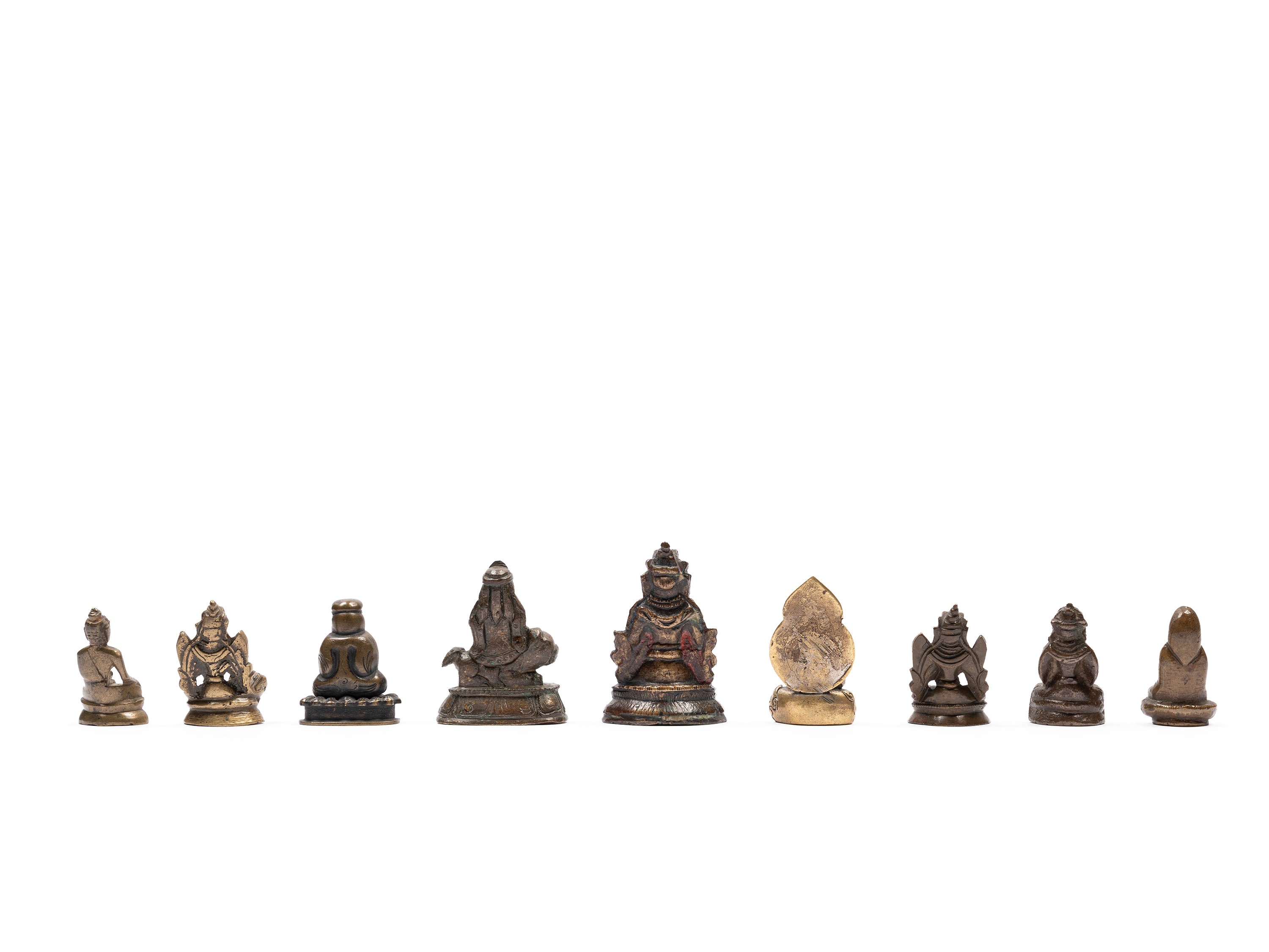 Nove Piccole Figure in Bronzo