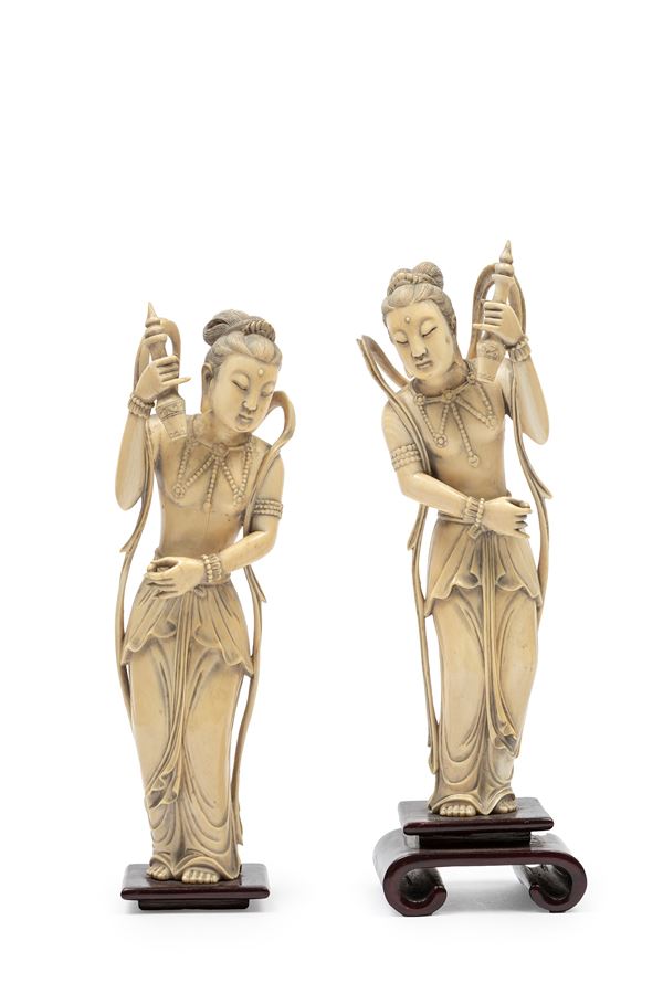 ☼A PAIR OF IVORY SCULPTURES