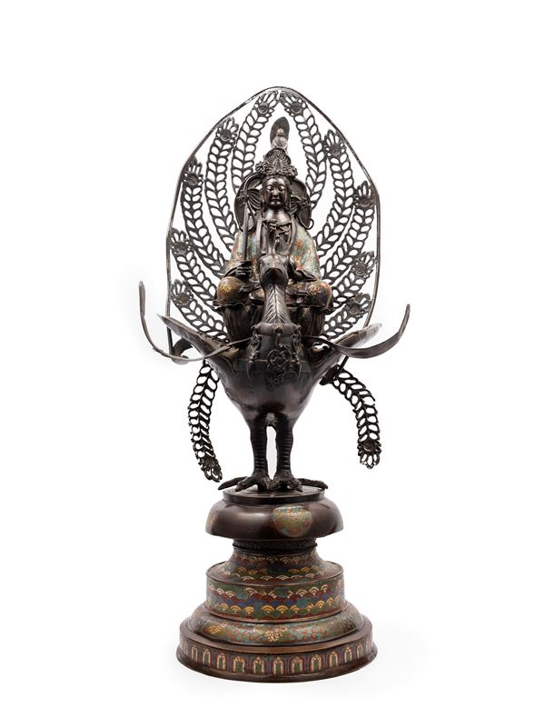 A BRONZE AND CLOISONNÉ FIGURE OF A GUANYIN