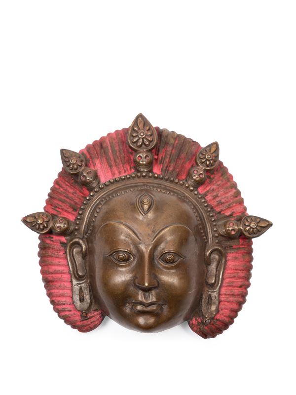 A BRONZE RITUAL MASK