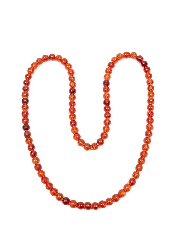 A LARGE AMBER NECKLACE