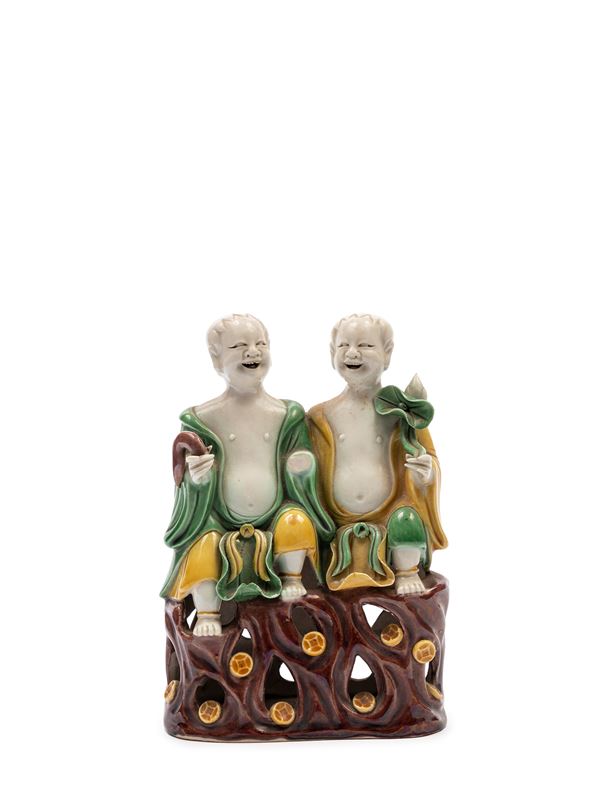A FAMILLE VERTE PORCELAIN FIGURE