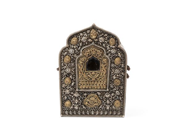 GAU PRAYER BOX IN GILT AND SILVERED COPPER.