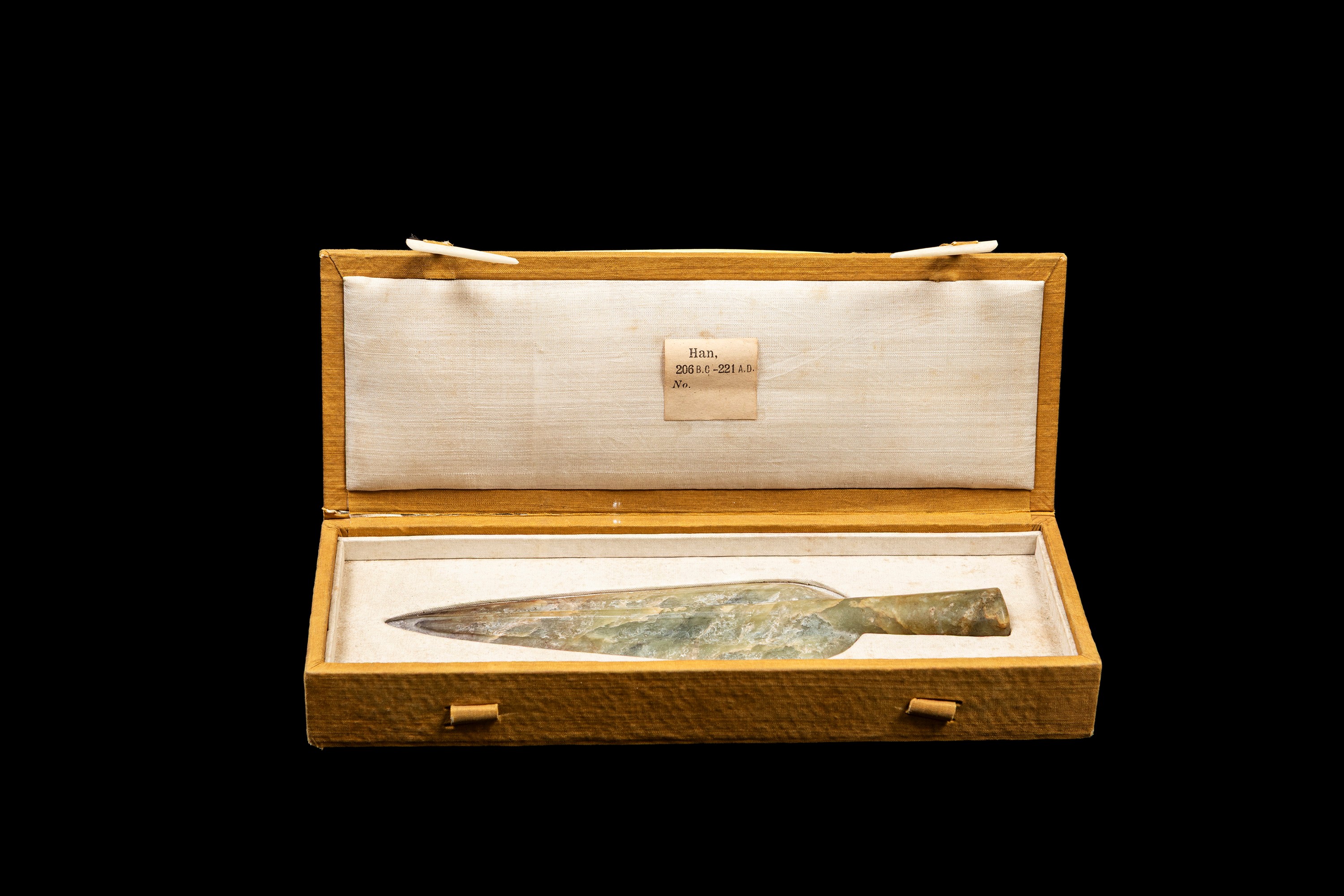 PUNTA DI FRECCIA IN GIADA CELADON E RUGGINE