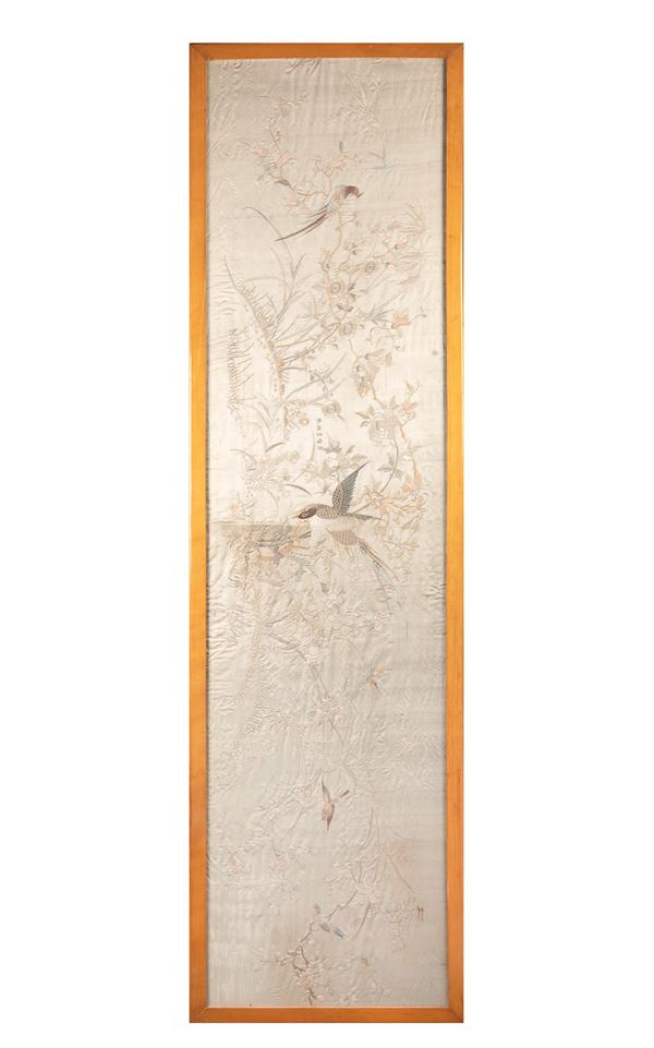 A LARGE EMBROIDERY ON SILK