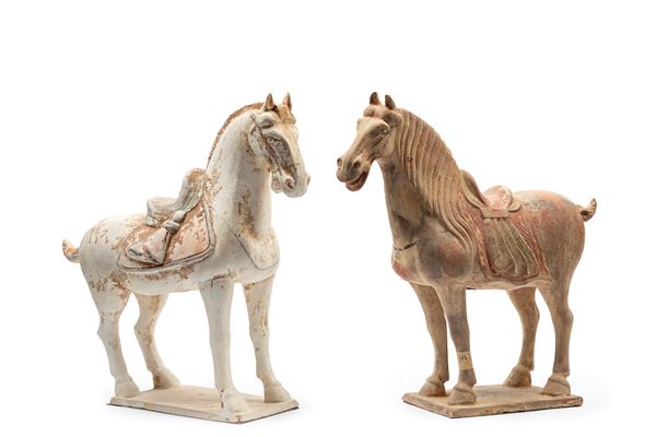 A PAIR OF CHINESE TERRACOTTA HORSES IN TANG STYLE