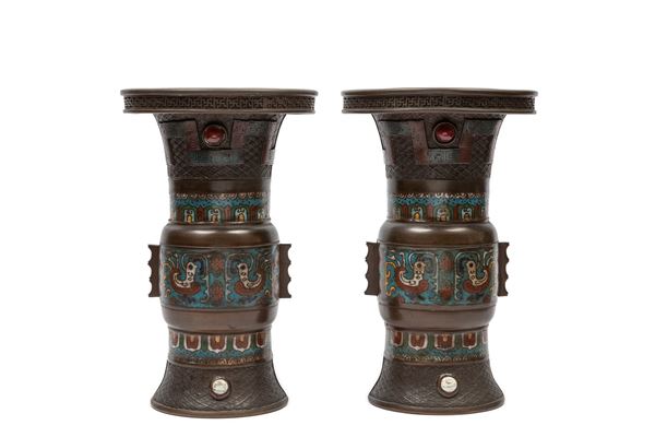 A PAIR OF BRONZE VASES
