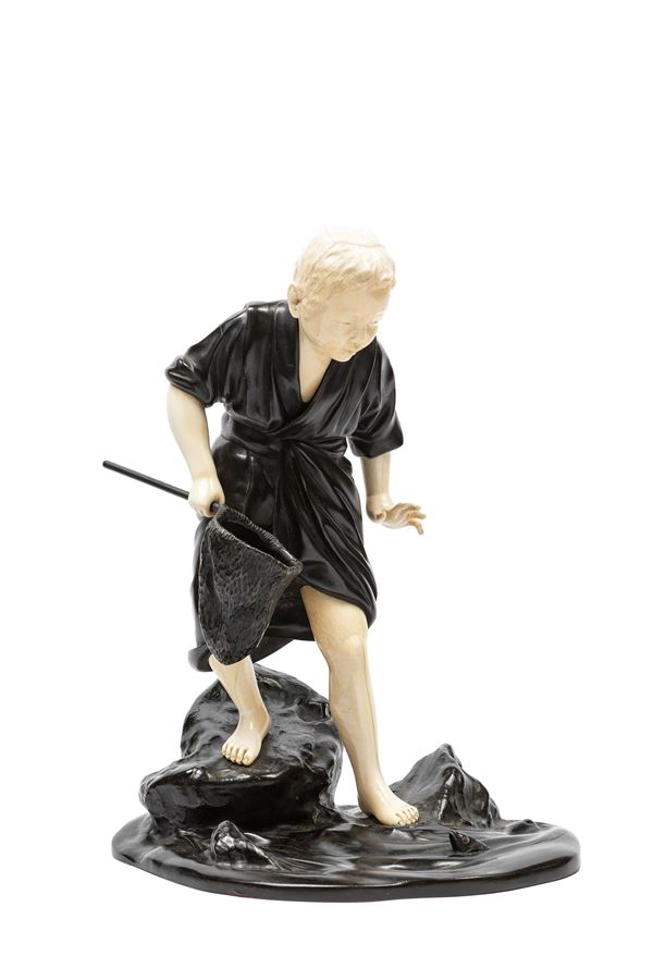☼AN IVORY AND BRONZE OKIMONO