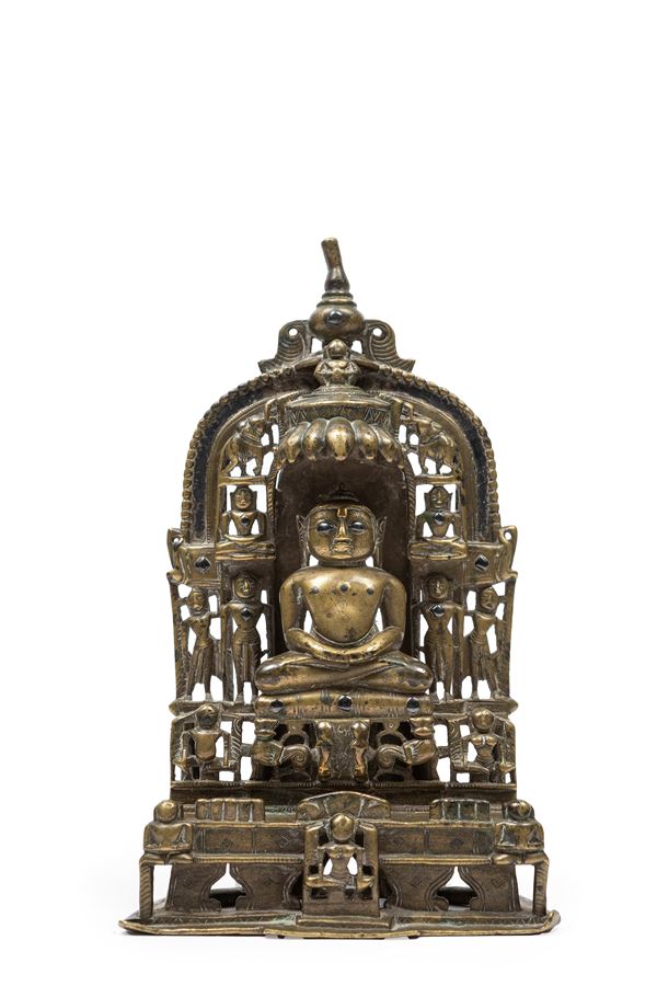 A BRASS SILVER FIGURE OF BUDDHA
