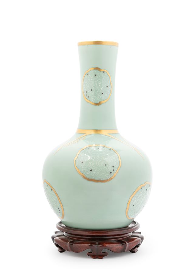A CELADON GROUND GILT PORCELAIN VASE