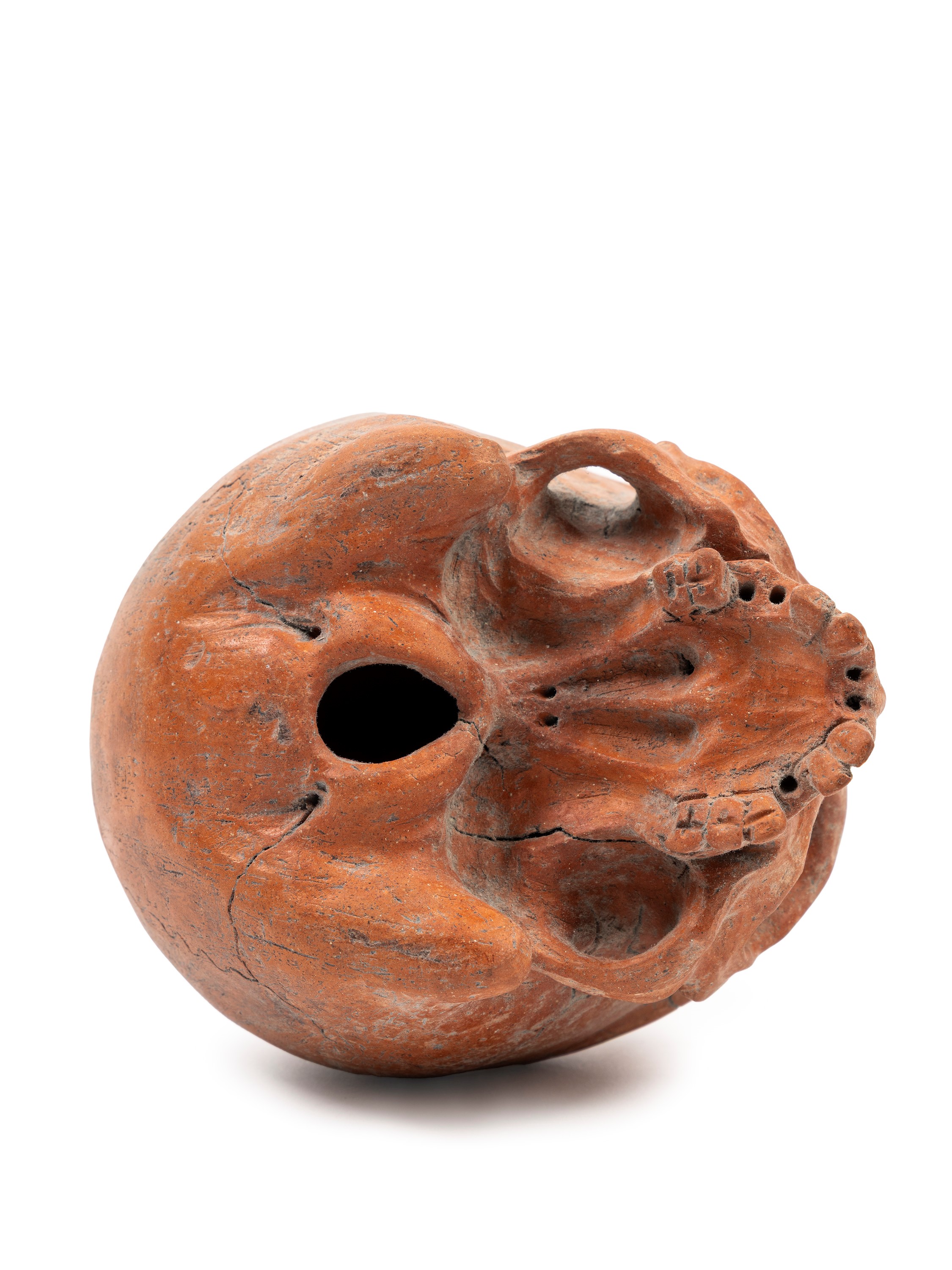 Teschio in terracotta con iscrizione