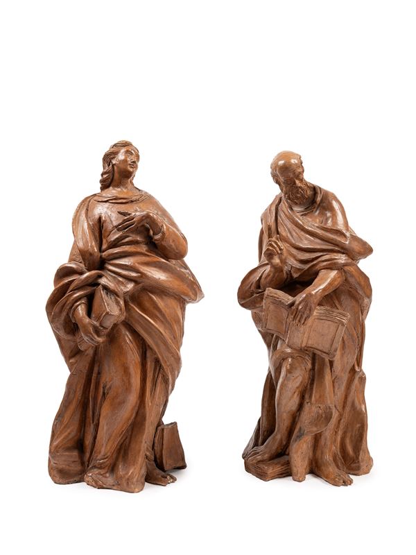 A PAIR OF TERRACOTTA SCULPTURES.
