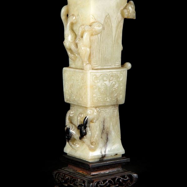 A FINE MOTTLED JADE ARCHAISTIC GU FORM VASE