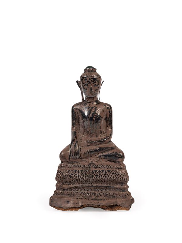 A SILVER LEAF BUDDHA