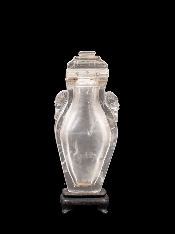 A CRYSTALK ROCK VASE AND COVER