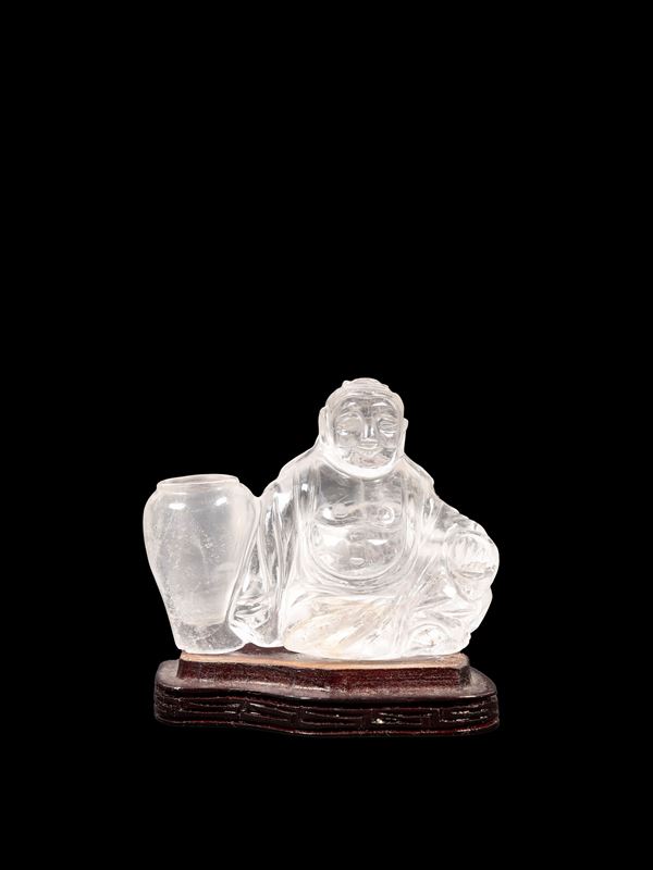 A SMALL ROCK CRYSTAL BUDAI 