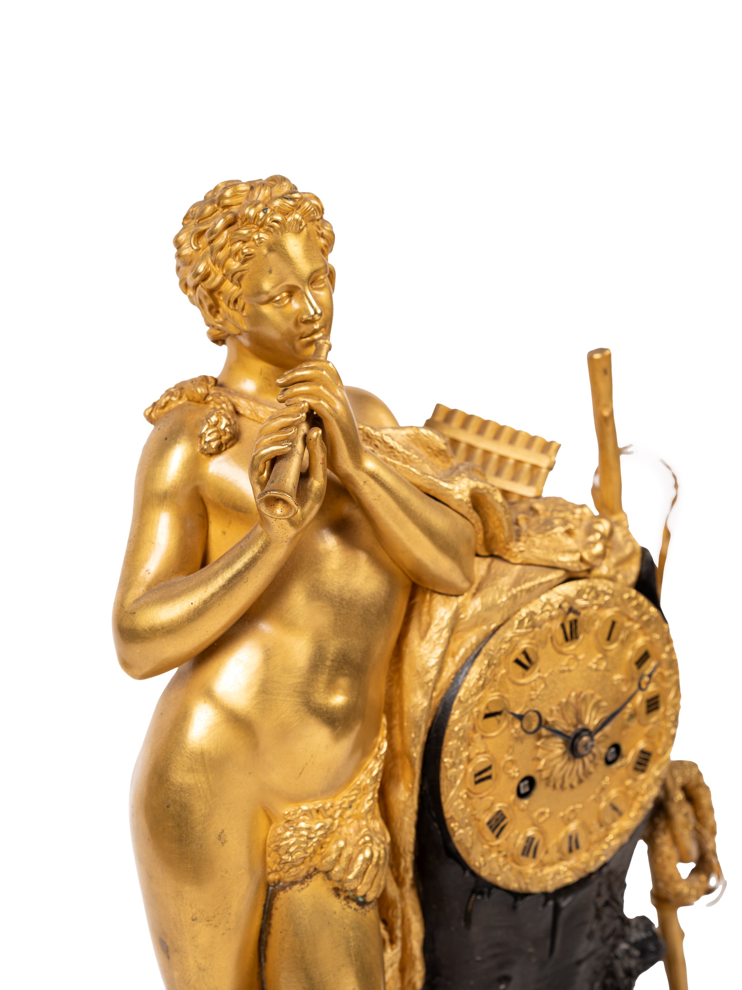 Pendola in bronzo dorato raffigurante un fauno che suona il flauto