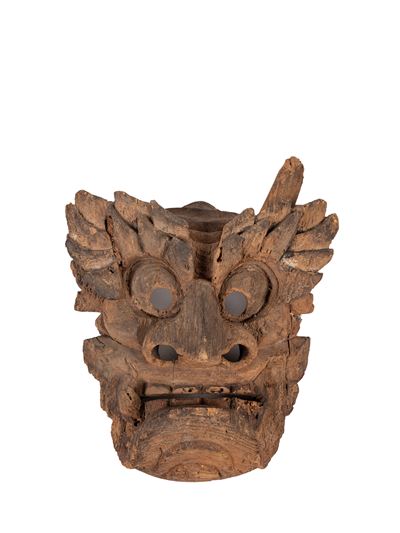 Maschera orientale antica in legno raffigurante un demone
