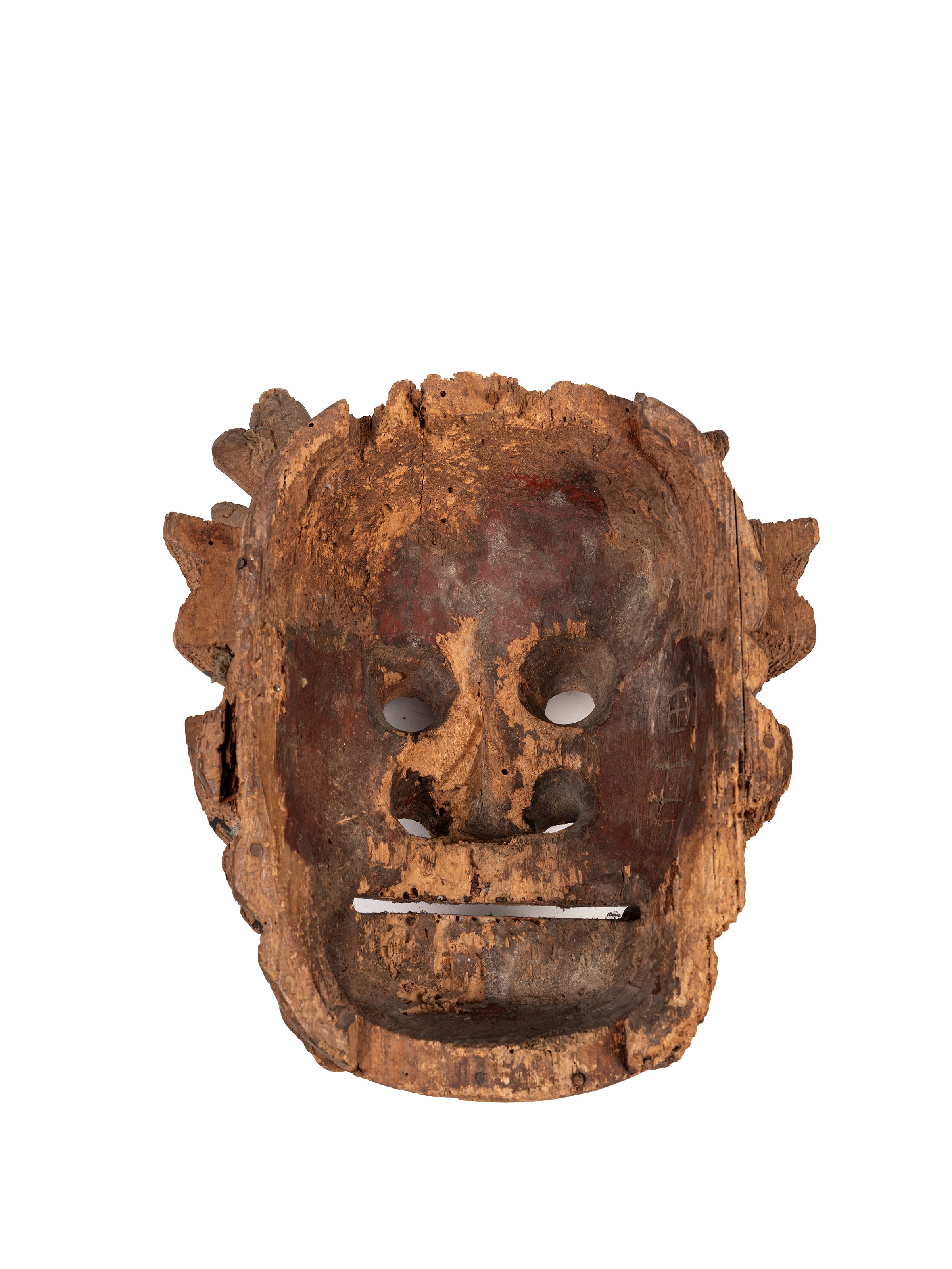 Maschera orientale antica in legno raffigurante un demone
