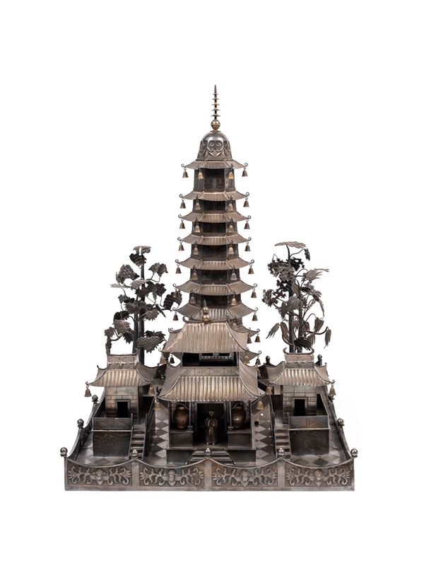 A LARGE SILVER MODEL OF A TEMPLE WITH PAGODAS