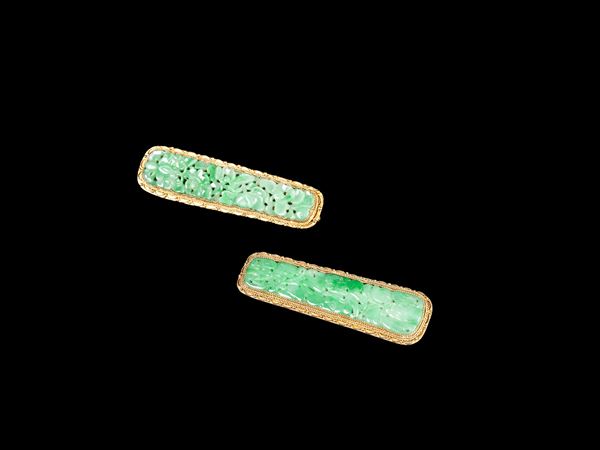 TWO APPLE-GREEN JADEITE PINS