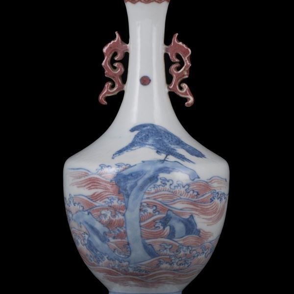 A SMALL UNDERGLAZE RED AND BLUE VASE
