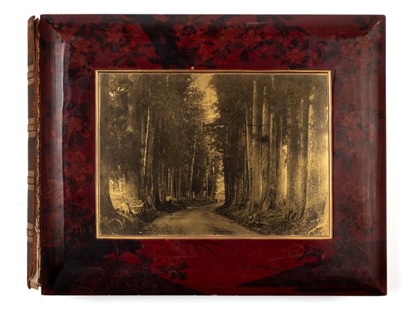 AN HAND-COLOURED PHOTOGRAPHIC ALBUM