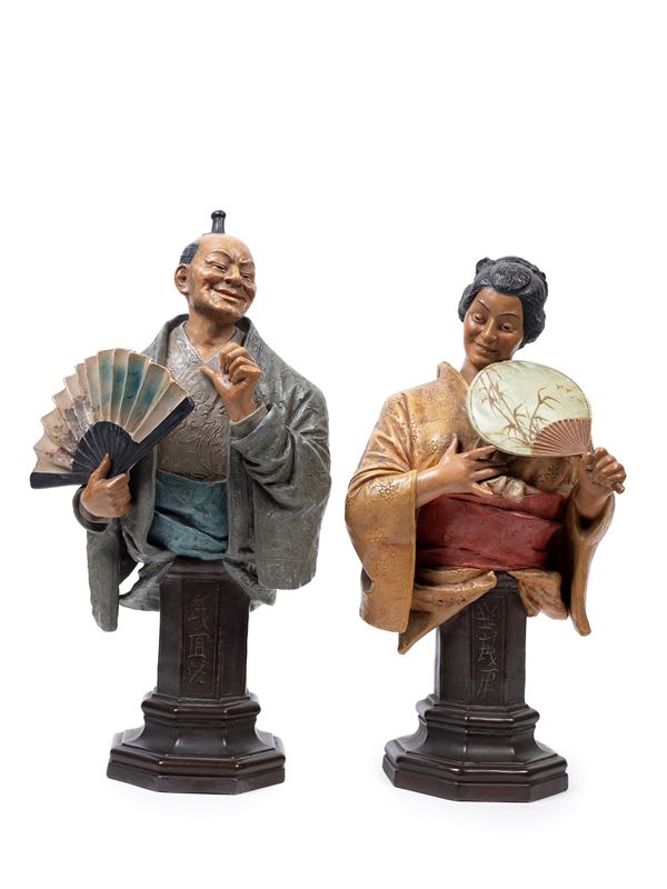 A PAIR OF POLYCHROME TERRACOTTA SCULPTURES