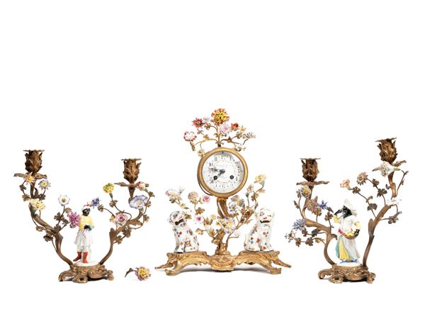 TRIPTYCH IN POLYCHROME PORCELAIN AND GILT BRONZE