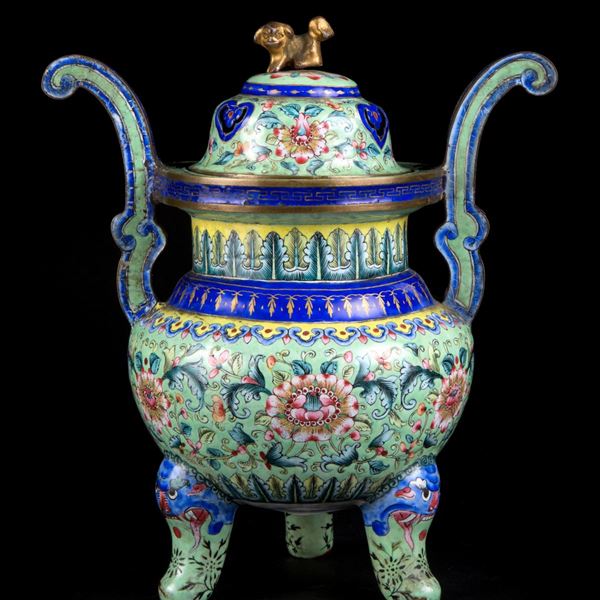 AN ENAMEL ON COPPER TRIPOD CENSER