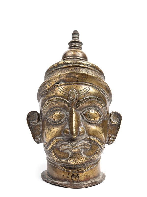 BRONZE SCULPTURE DEPICTING A MUKHALINGA