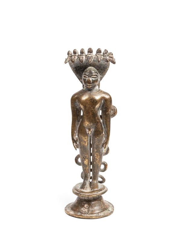 A BRASS SCULPTURE OF JINA PARSVANATHA
