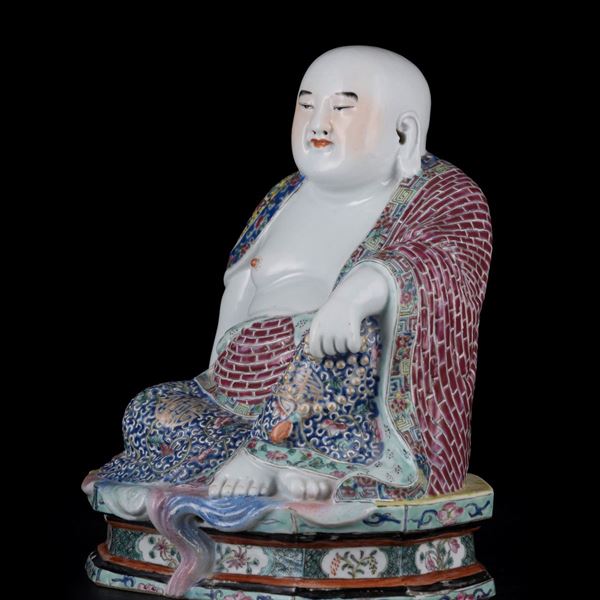 A RARE PORCELAIN SEATED BUDDHA MARKED BY WEI HONGTAI