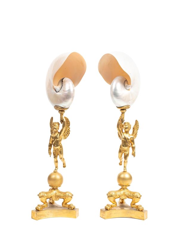 PAIR OF NAUTILUS SHELLS MOUNTED IN GILT BRONZE