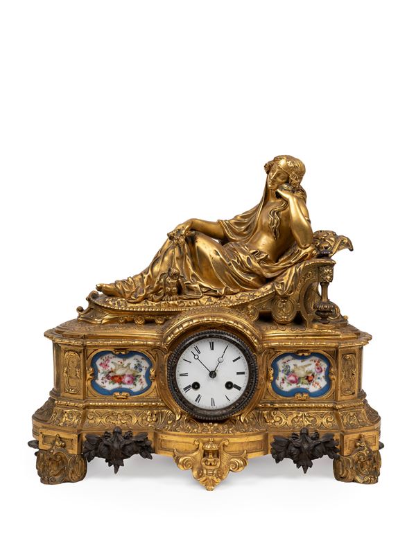 A GILT BRONZE CLOCK