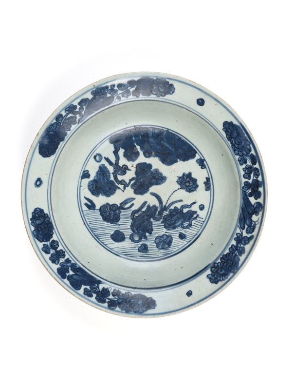 A BLUE AND WHITE 'LOTUS POND' PORCELAIN DISH