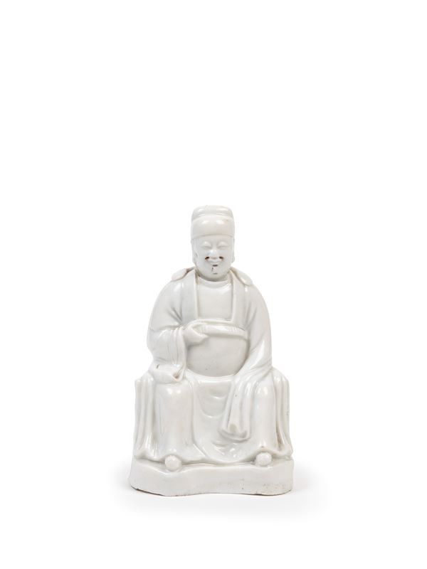 A BLANC-DE-CHINE PORCELAIN FIGURE