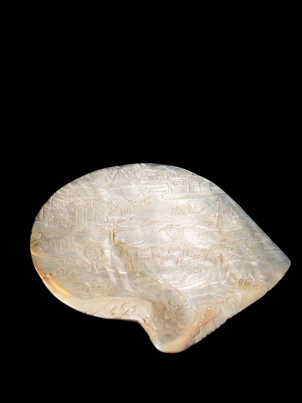 A MOTHER OF PEARL SHELL