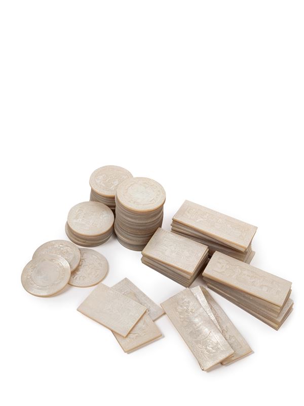 A SET OF MOTHER-OF-PEARL GAMING COUNTERS